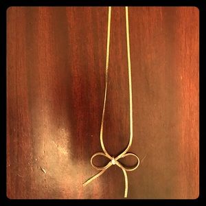Gold bow necklace